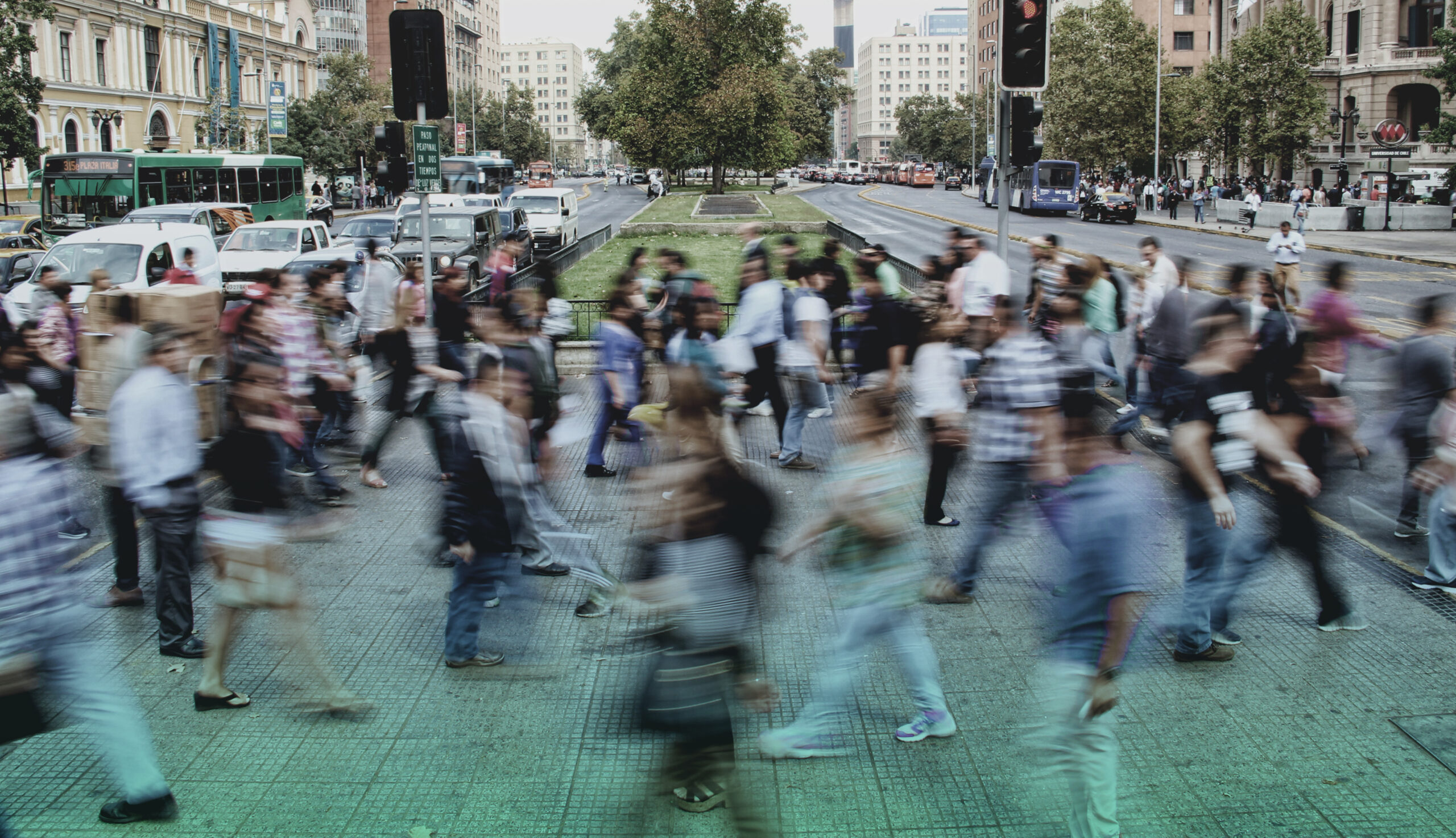 Diverse crowd of people walking in a busy city, representing global multilingual audiences